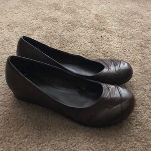 Brown shoes with a tiny wedge
